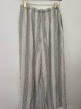 green and white striped linen pants with elastic waistband and pockets